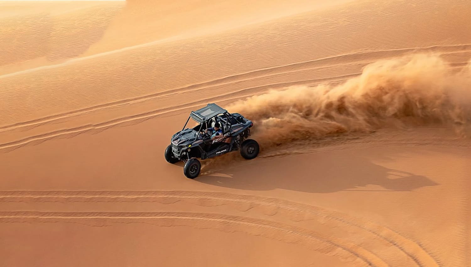 Dune Buggy Dubai, A bird view of dune buggy while dune bashing in the red dunes of dubai.